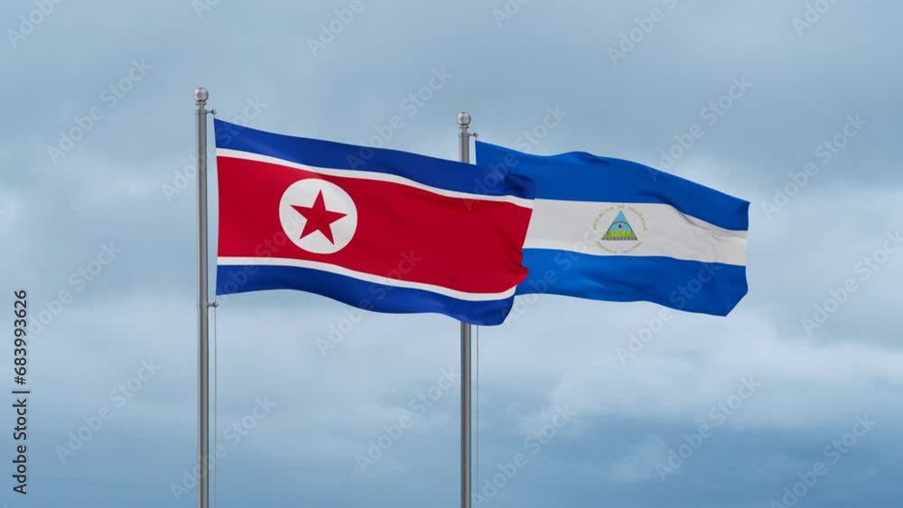 Nicaragua flag and North Korea flag waving together on cloudy sky, endless seamless loop, two country relations concept Nicaragua flag and North Korea flag waving together on cloudy sky, endless seamless loop, two country relations concept