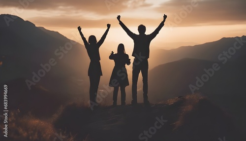silhouette of a people with arms raised up to the sky, standing on a mountain, symbolic success, success concept