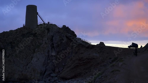 Panoramic view of the Torre del Pirulico, Spain under a sky with clouds at sunset photo