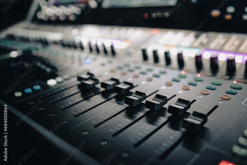 Sound control music mixer in record studio. Close up mixer and equalizer volume on the mixer amplifier. Digital audio system Sound control music mixer in record studio. Close up mixer and equalizer volume on the mixer amplifier. Digital audio system