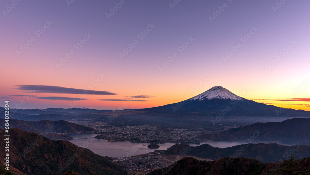 Panoramic view of Mt. Fuji and Lake Kawaguchiko at magic hour. Panoramic view of Mt. Fuji and Lake Kawaguchiko at magic hour.