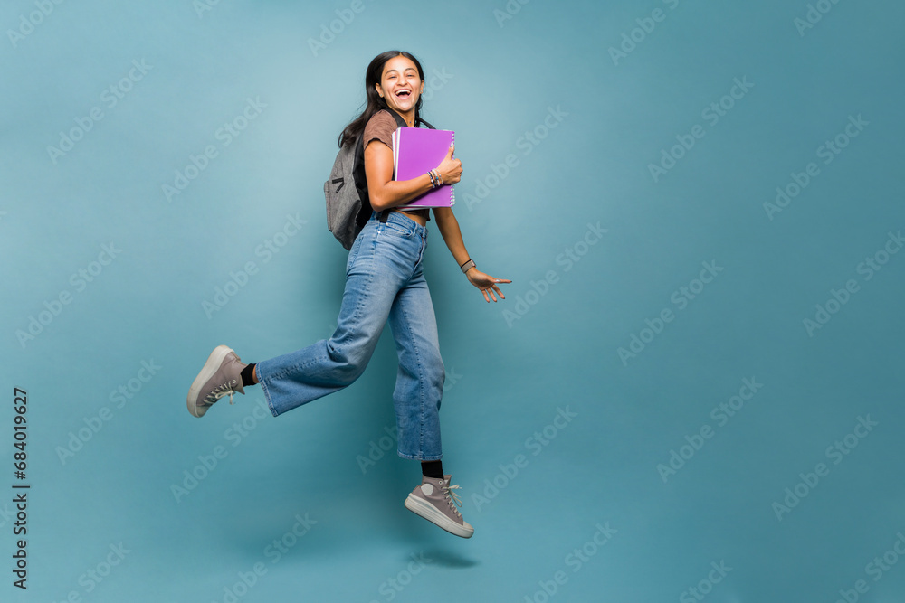 Attractive young woman having fun going to college