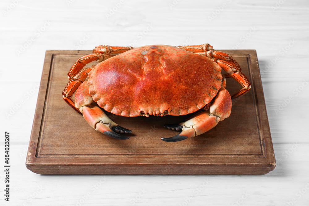 Delicious boiled crab on white wooden table