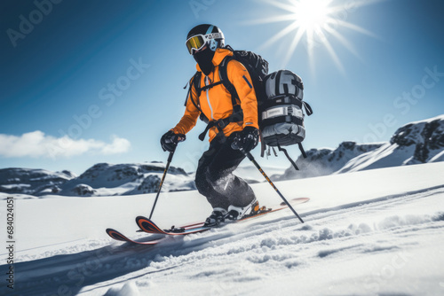 skier jumping in the snow mountains on the slope with his ski and professional equipment on a sunny day