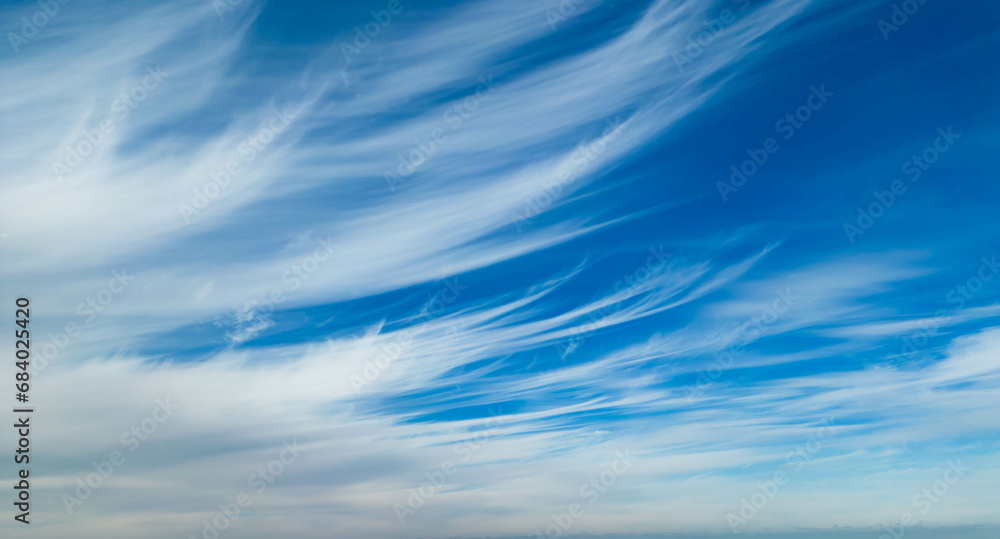 Wispy clouds in a blue sky Wispy clouds in a blue sky