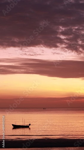 Sunrise over the sea, Huahin beacj, Thailand. Vertical video. photo