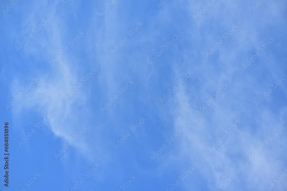 Blue gradient clouds, beauty in summer, soft white background with clear clouds in calm sunlight, bright winter weather, bright turquoise landscape during daytime. Sky view. Spring. Sky background. Blue gradient clouds, beauty in summer, soft white background with clear clouds in calm sunlight, bright winter weather, bright turquoise landscape during daytime. Sky view. Spring. Sky background.