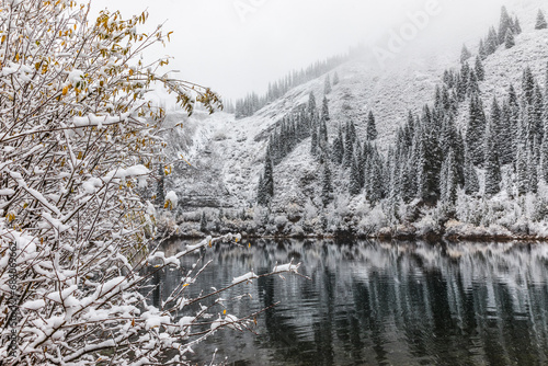 mountain landscape of Lake Kaindy in the Kungei Alatau gorge, it is called the “sunken forest”, Kazakhstan photo