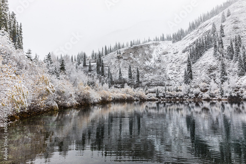 mountain landscape of Lake Kaindy in the Kungei Alatau gorge, it is called the “sunken forest”, Kazakhstan photo