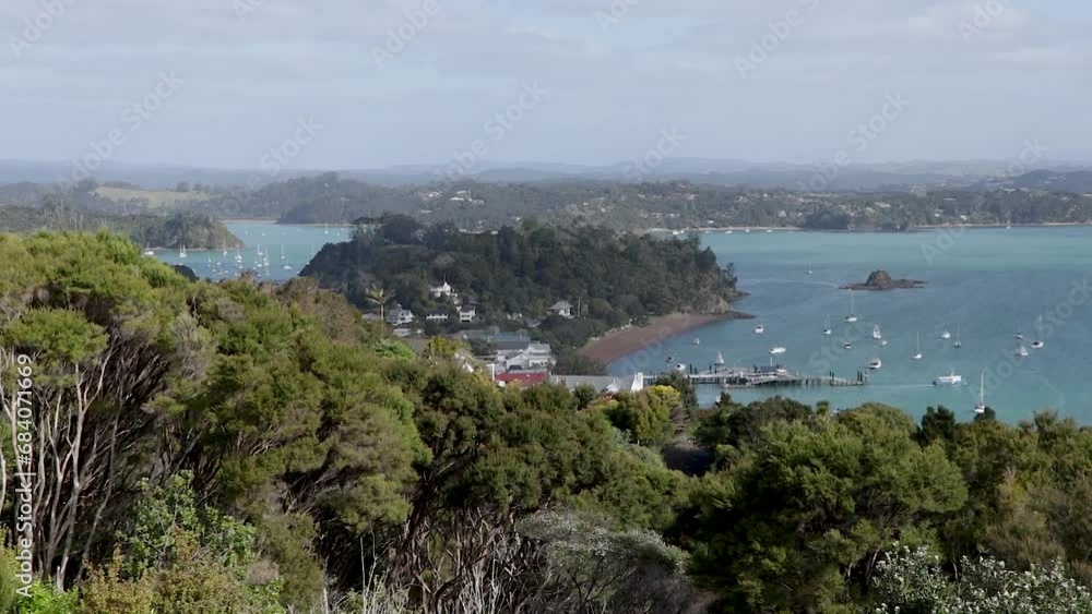 Russell Peninsula's Coastal Beauty, Where Lush Green Bush Meets Blue Bay Waters at Flagstaff Hill Lookout, Bay of Islands, New Zealand Russell Peninsula's Coastal Beauty, Where Lush Green Bush Meets Blue Bay Waters at Flagstaff Hill Lookout, Bay of Islands, New Zealand