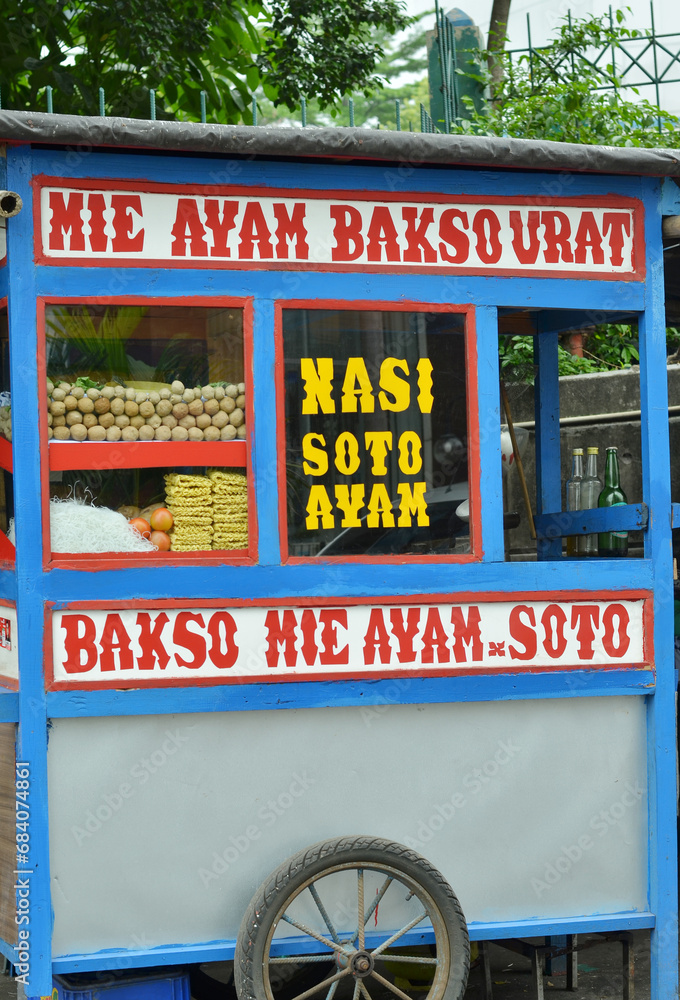 food cart Indonesian street food sells Bakso ( meatball) , Mie Ayam
