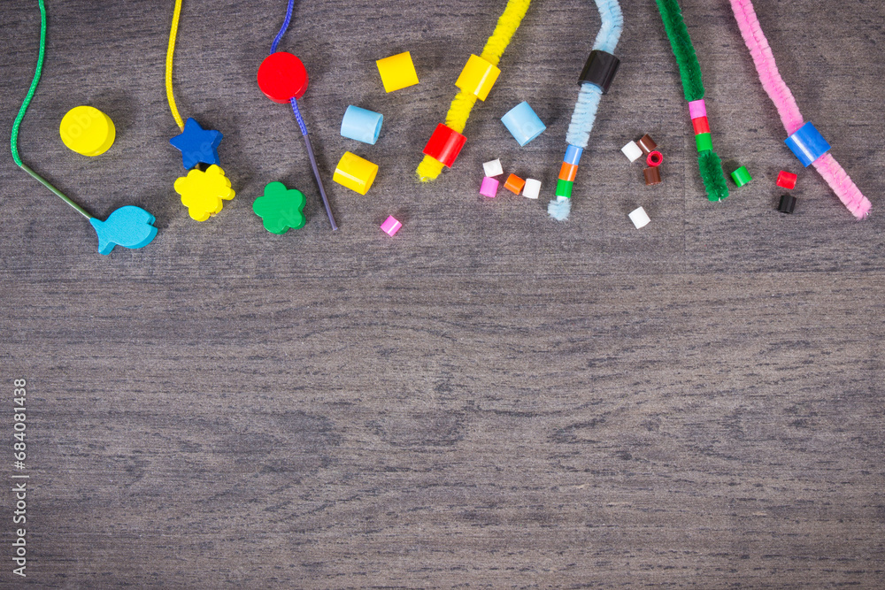 Thread, creative sticks and beads used to making bracelets, learn ...