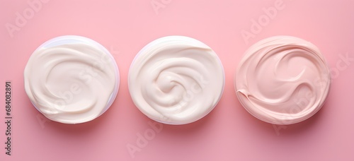 Assorted Creams in Pastel Hues on a Soft Pink Background for Skincare and Beauty Concepts Generative AI
