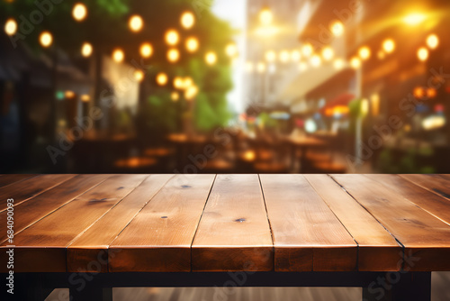 Empty wooden table light brown wood texture Blurred background  night city  bokeh  surreal lights