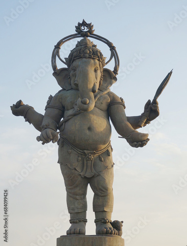 Large stone Ganesha statue in the evening