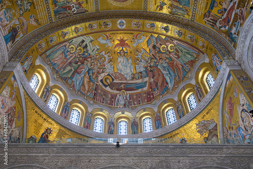 Saint Sava Orthodox temple interior with golden mosaic decorations and Christian icons in Belgrade, Serbia