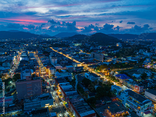 ..aerial view The lights twinkled along Talang walking street at night..Bright colors along the beach city area at night..beautiful sky in twilight.