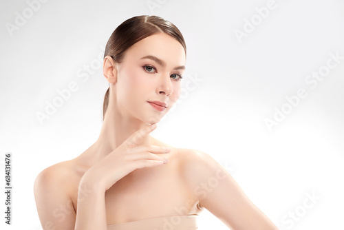 Beautiful young woman with clean fresh skin on white background, Face care, Facial treatment, Cosmetology, beauty and spa, women portrait.