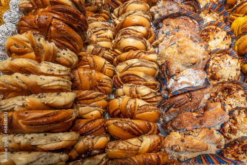 Photography Stockholm, Sweden A bakery display of cinnamom buns and other pastries