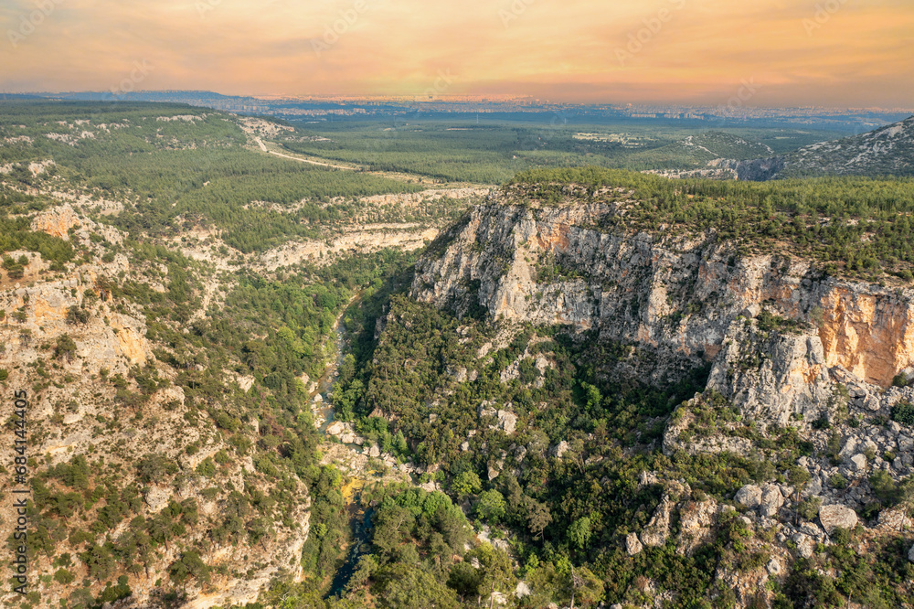 Aerial drone view of Güver canyon, covered with steep cliffs and pine trees. Antalya - TURKEY