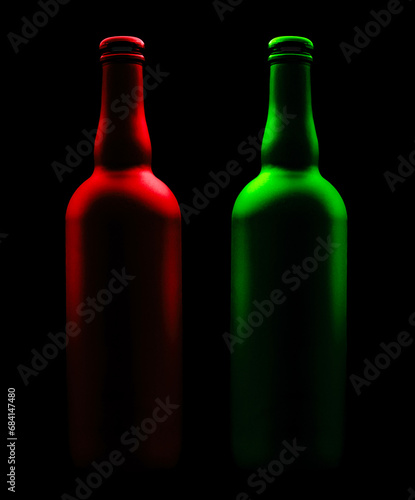 matte red and green bottle on dark background