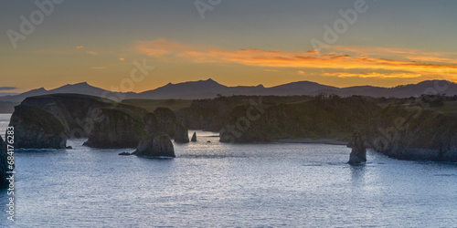 Colorful sunset in unnamed bay on the island of Shikotan, Kuril Islands.