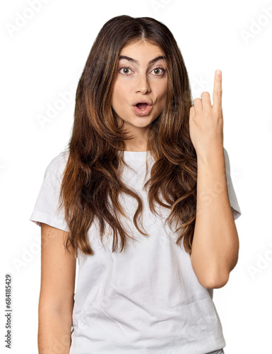 Wallpaper Mural Young Caucasian woman in studio setting having an idea, inspiration concept. Torontodigital.ca