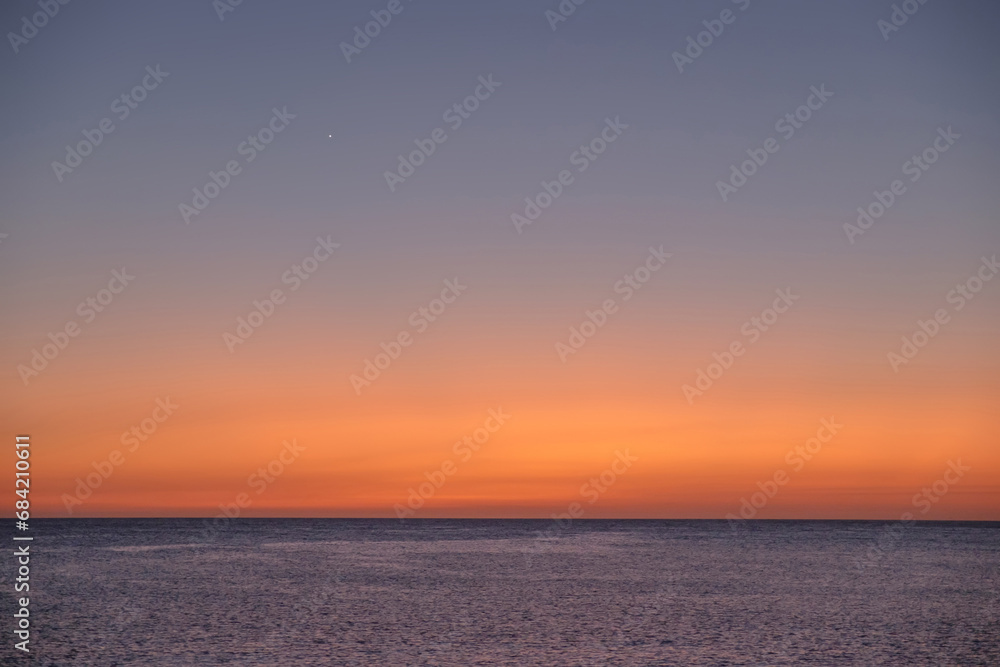 Background with sea on the sunset and Venus star, space for text