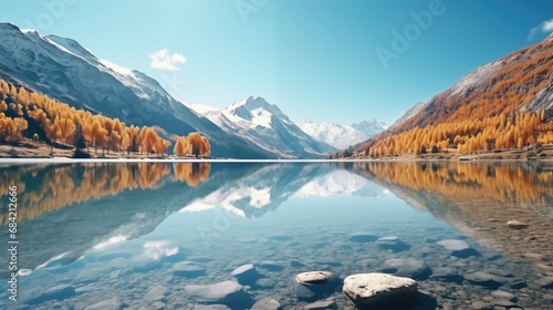 Landscape with mountains, lake and autumn trees © Victor