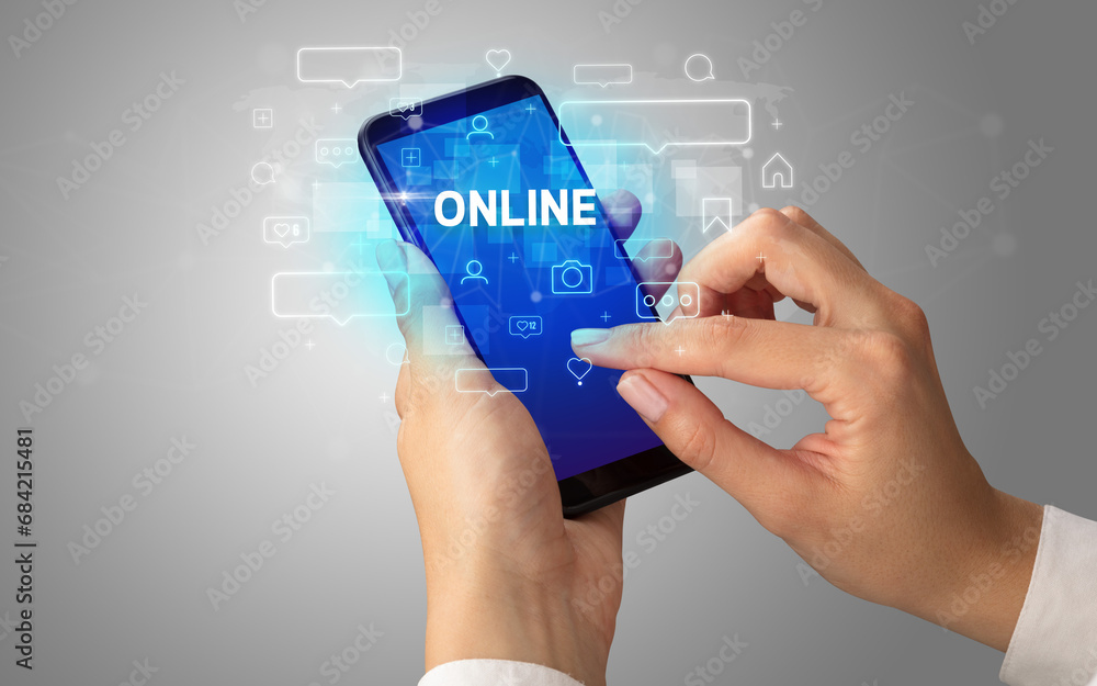 Hand using smartphone with social media concept Hand using smartphone with social media concept