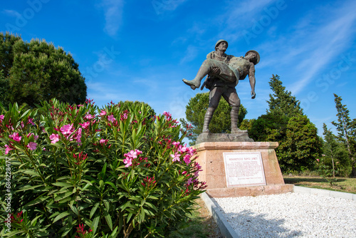 Canakkale / Turkey, May 26, 2019 / Monument of a Turkish soldier carrying wounded Anzac soldier at Canakkale (Dardanelles) Martyrs' Memorial, Turkey.