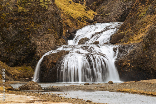 Long exposure shot of Stj  rnarfoss waterfall  next to Kirkjub  jarklaustur  Southern Region  Iceland