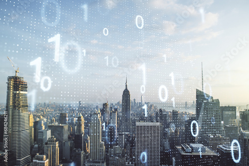 Double exposure of abstract virtual binary code hologram on New York city skyscrapers background. Database and programming concept photo