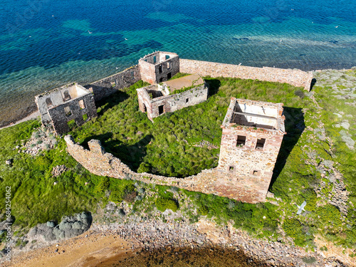 Historic ancient monastery on an island around the Patrica beach. Shooting with drone. (Turkish name; kizlar manastiri) Cunda - Ayvalik - Turkey photo