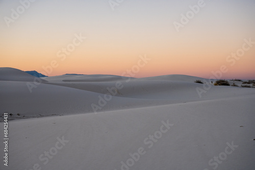 Shadows and Light Of Sand Dunes Against Fading Light Of Sunset