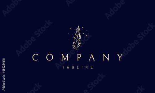 Vector golden logo with an abstract image of a wheat ear.
