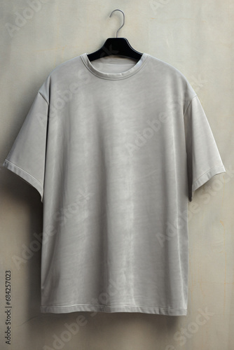 Gray Oversized T-shirt Mocup On Concrete Background