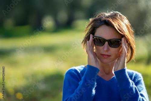 Middle aged women with sunglasses