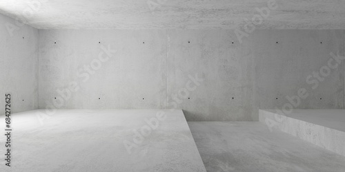 Abstract empty, modern concrete room with wide groove or trench in the floor and soft light - industrial interior background template photo