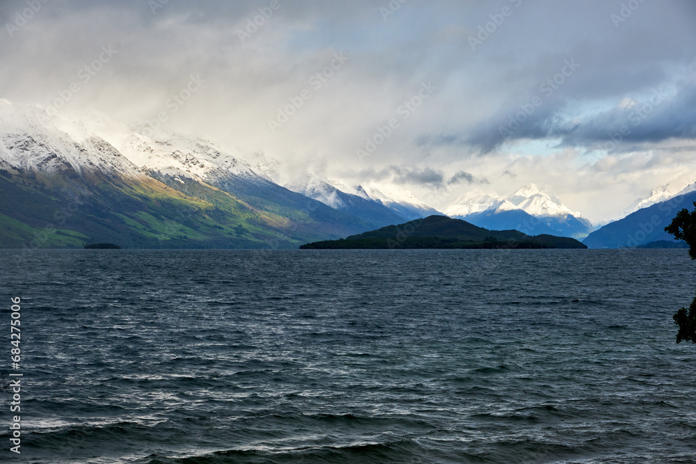 lake and mountains in queenstown, new zealand