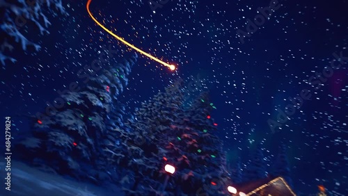 3D Animated Firework Rushes Through Snow Covered House In The Middle Of Forest Surrounded By Christmas Decorations.