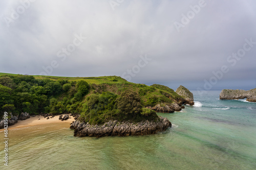 Playa de Barnejo-Berrellíng is a beautiful beach located on the western coast of Cantabria, of great natural beauty due to its striking karst formations, Spain photo