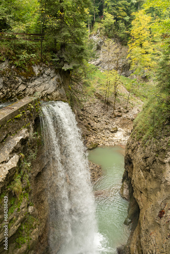 Waterfall at the Rappenloch valley in Dornbirn in Austria photo