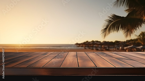 Concept of advertising image for product. Wooden table with blurred background located next to the beach. In the background and spectacular sunset