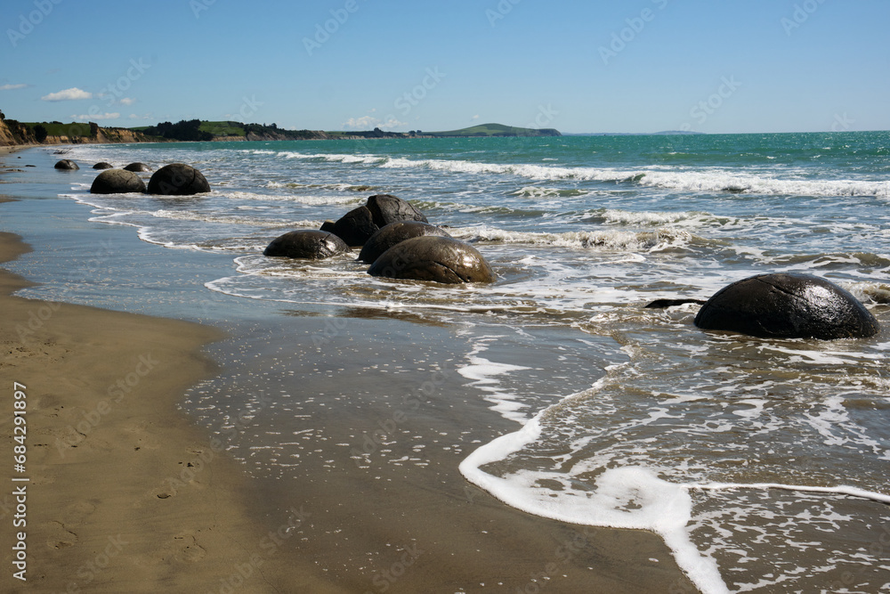 Round rocks on the beach in Hillgrove, new zealand Round rocks on the beach in Hillgrove, new zealand