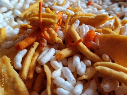 Close up of a plate of crunchy mix farsan namkeen photo