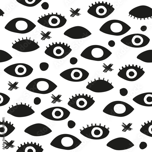 abstract pattern with many restless eyes. black silhouettes of eyes scattered over a white background. punk background