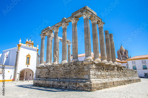 Ancient columns of a monument, Evora, Portugal photo