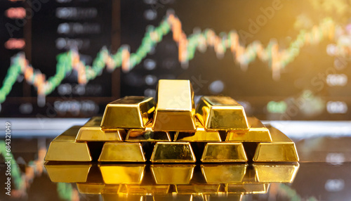 Gold price throughout stock Gold bars placed on top of stocks and stock charts