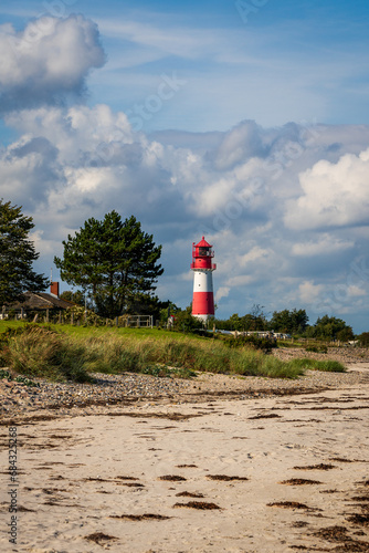 Lighthouse on the Baltic Sea with an overcast sky.